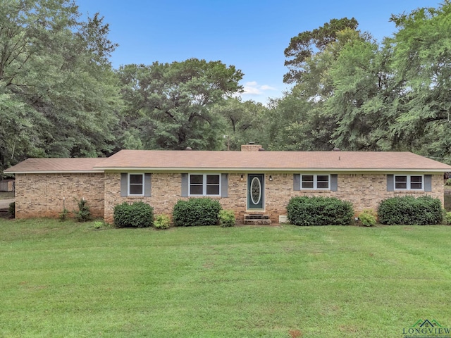 4202 Brent Rd, Longview, TX 75604 - single story home featuring a front yard and brick siding