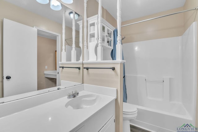 4202 Brent Rd, Longview, TX 75604 - bathroom featuring toilet, vanity, and shower / bathtub combination with curtain