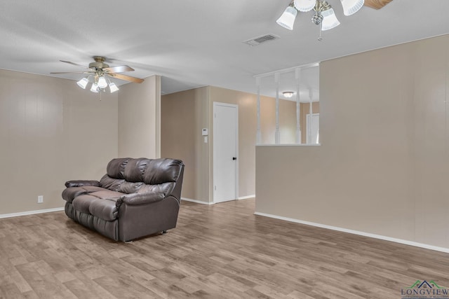 4202 Brent Rd, Longview, TX 75604 - sitting room featuring ceiling fan, wood finished floors, and baseboards