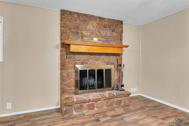 4202 Brent Rd, Longview, TX 75604 - detailed view of wood finished floors, a fireplace, and baseboards
