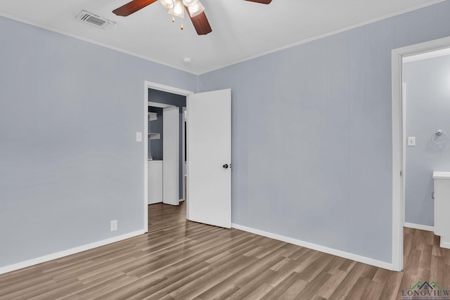 4202 Brent Rd, Longview, TX 75604 - empty room featuring a ceiling fan, wood finished floors, baseboards, and ornamental molding
