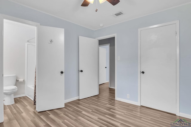 4202 Brent Rd, Longview, TX 75604 - unfurnished bedroom featuring light wood-style floors, ensuite bath, baseboards, crown molding, and a ceiling fan