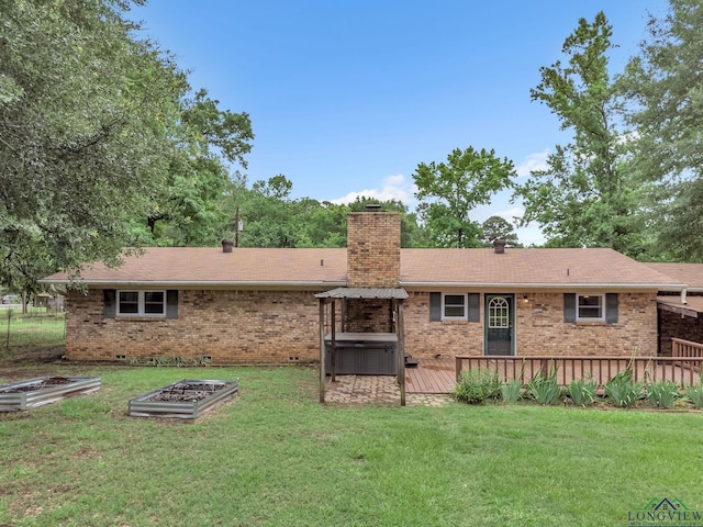 4202 Brent Rd, Longview, TX 75604 - rear view of house with a garden, brick siding, a chimney, and a wooden deck