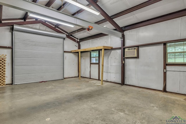 4202 Brent Rd, Longview, TX 75604 - garage featuring a wall mounted air conditioner