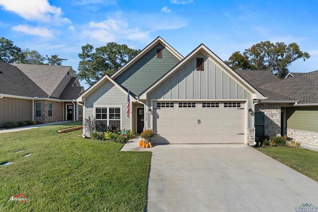 view of front of home featuring a garage and a front lawn