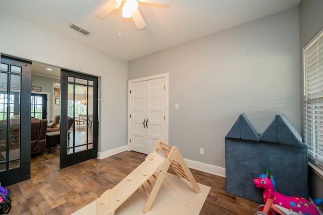 10740 Fm 2685, Gladewater, TX 75647 - foyer featuring french doors, wood finished floors, ceiling fan, and baseboards