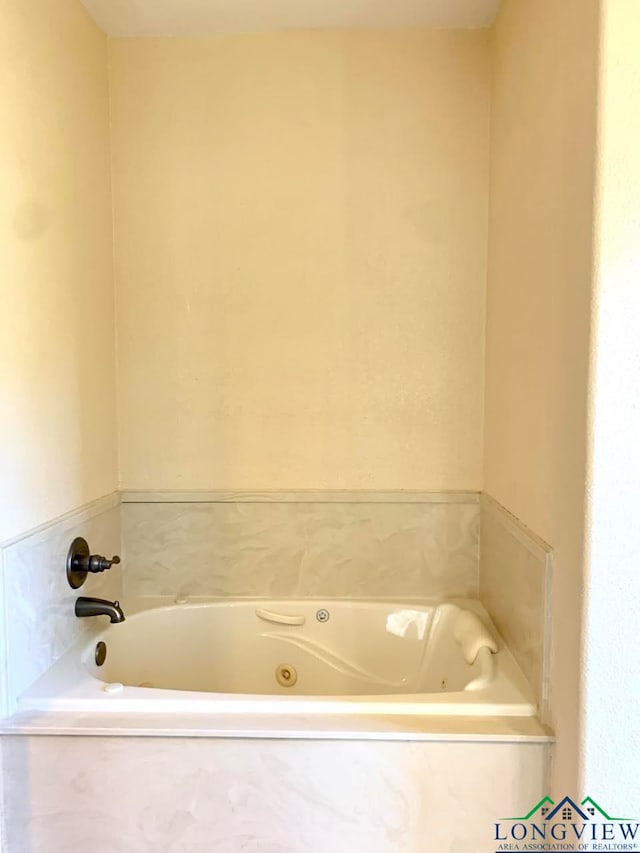 bathroom with a bath