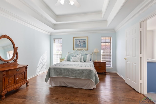 3314 Storey Lk, Tyler, TX 75707 - bedroom with a raised ceiling, dark wood-style flooring, ornamental molding, and multiple windows