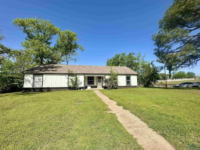 403 Church, Winnsboro, TX 75494 - ranch-style house featuring a front yard