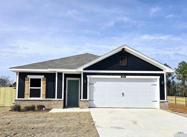 view of front of home with a garage