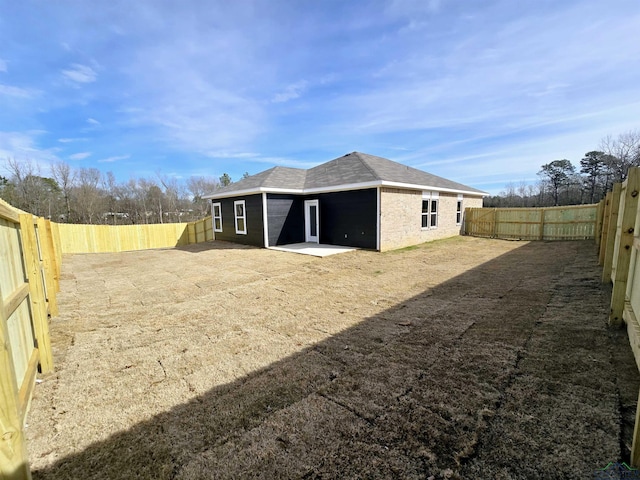 rear view of house featuring a patio area