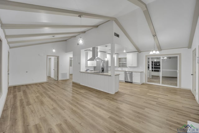 unfurnished living room with beamed ceiling, light wood-type flooring, high vaulted ceiling, and an inviting chandelier