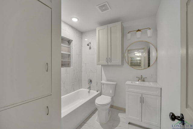 full bathroom with vanity, tiled shower / bath combo, and toilet