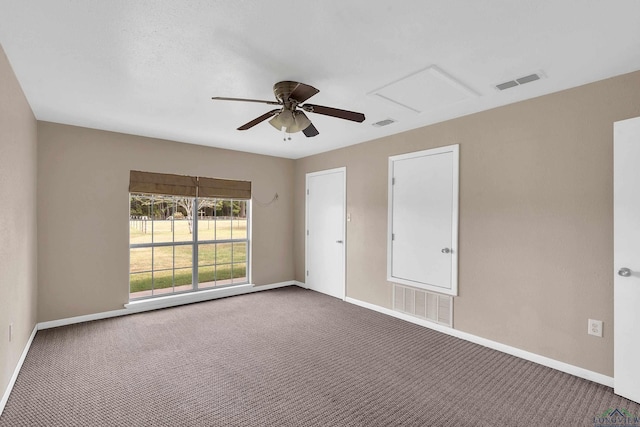 carpeted empty room with ceiling fan