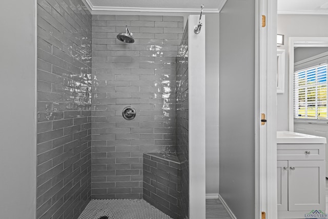 20505 Flat Creek Dr, Chandler, TX 75758 - bathroom featuring ornamental molding, a tile shower, and vanity