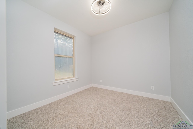 spare room with carpet floors