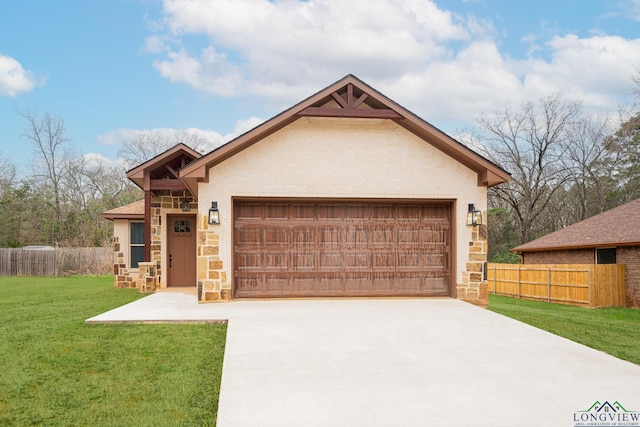 view of front of house featuring a garage and a front yard