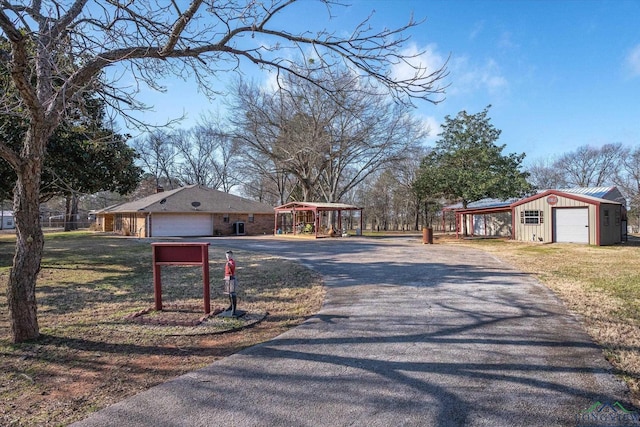 view of street featuring driveway