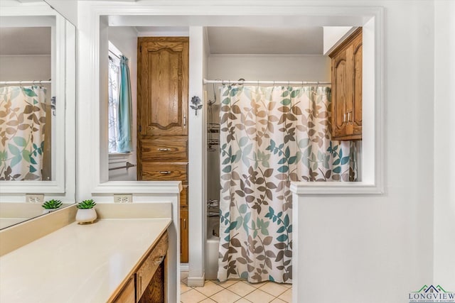 full bath with shower / bathtub combination with curtain, vanity, and tile patterned floors