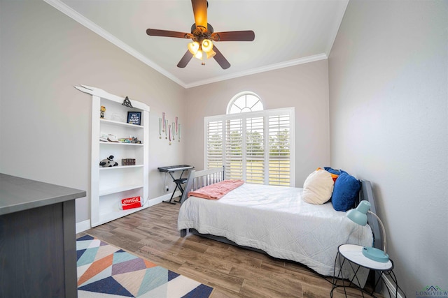 20064 Fm 1716 E, Tatum, TX 75691 - bedroom with crown molding, baseboards, a ceiling fan, and wood finished floors