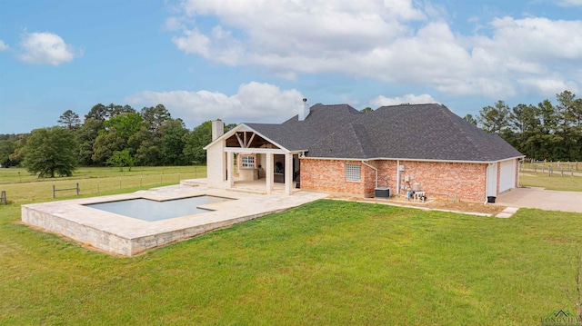 20064 Fm 1716 E, Tatum, TX 75691 - back of property featuring a yard, a chimney, and fence