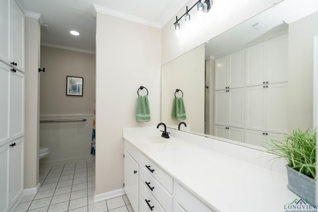 bathroom with tile patterned flooring, vanity, crown molding, and toilet