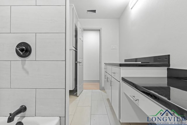 kitchen with white cabinets