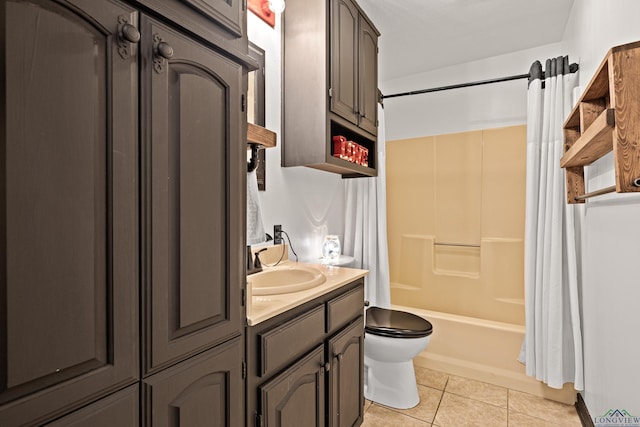 full bathroom with tile patterned flooring, shower / bath combo, vanity, and toilet