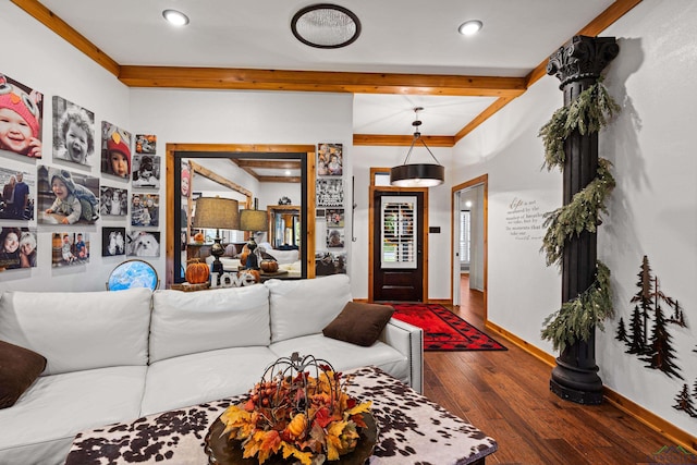 entrance foyer with dark hardwood / wood-style floors and ornamental molding