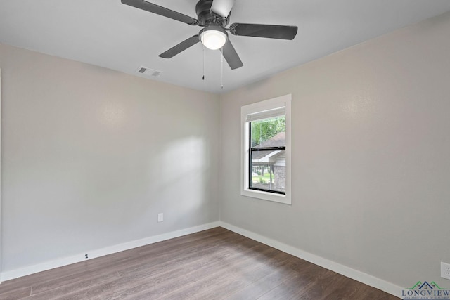 251 Crockett St, Lone Star, TX 75668 - spare room featuring wood finished floors and a ceiling fan