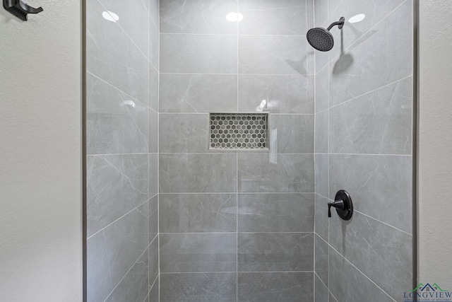 251 Crockett St, Lone Star, TX 75668 - bathroom featuring a tile shower