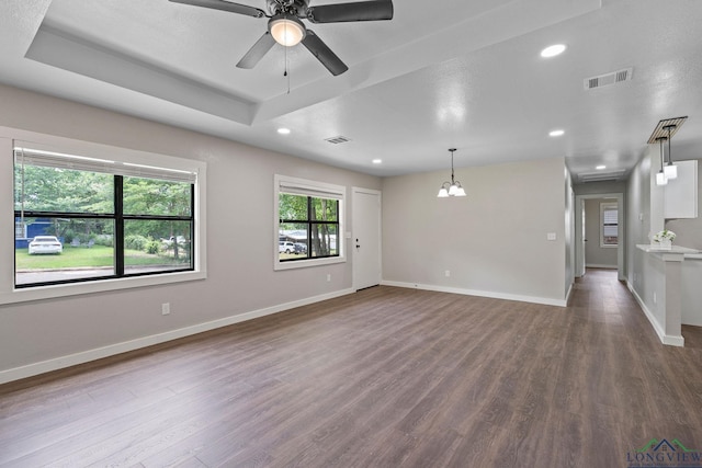 251 Crockett St, Lone Star, TX 75668 - unfurnished living room with dark wood-style floors, a ceiling fan, recessed lighting, and a chandelier