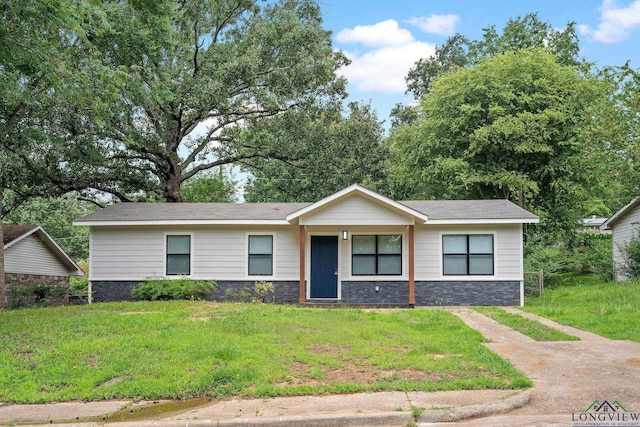 251 Crockett St, Lone Star, TX 75668 - ranch-style home with stone siding and a front yard