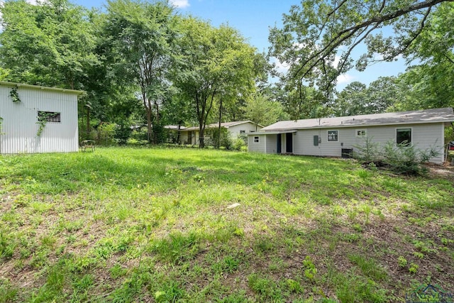 251 Crockett St, Lone Star, TX 75668 - view of yard with view of scattered trees