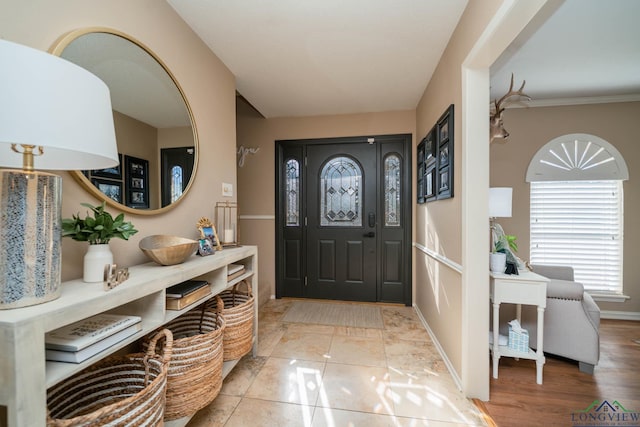 entrance foyer featuring baseboards