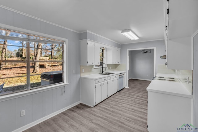 kitchen with dishwasher, sink, crown molding, white cabinets, and light wood-type flooring