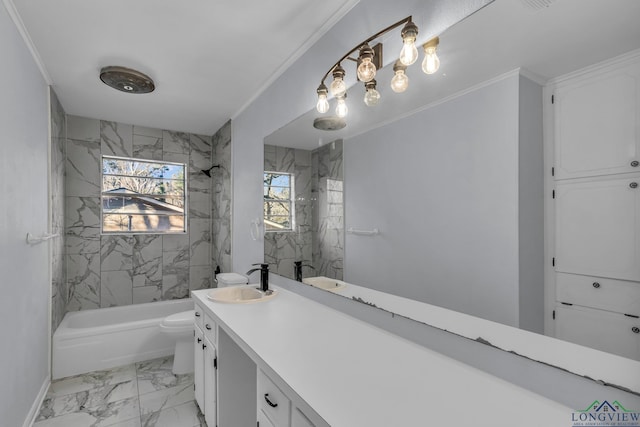 full bathroom with vanity, toilet, tiled shower / bath, and ornamental molding