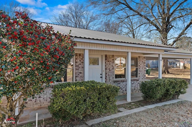 entrance to property with a porch