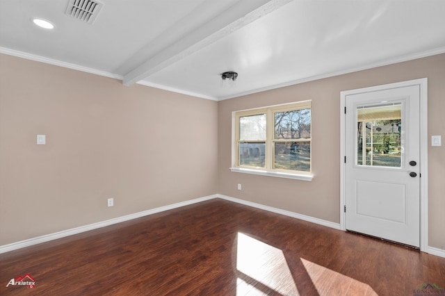 entrance foyer with dark hardwood / wood-style flooring, ornamental molding, and beamed ceiling