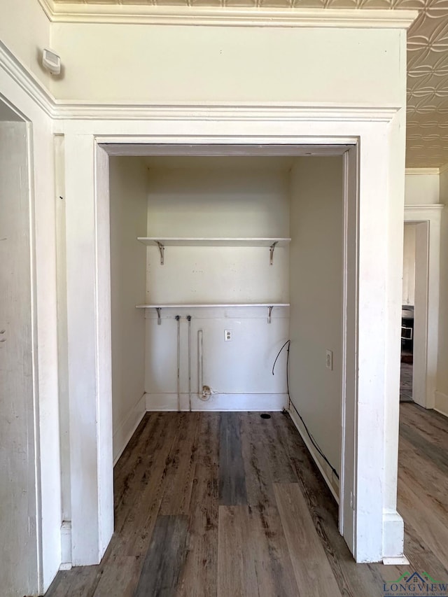 laundry room with laundry area and wood finished floors