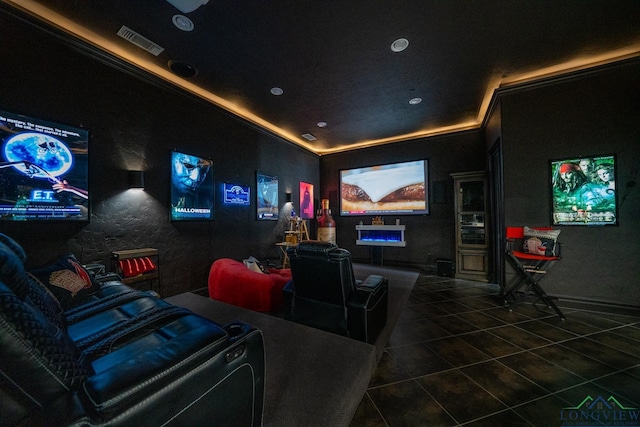 tiled home theater with visible vents and recessed lighting