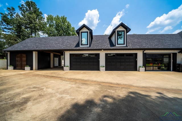 garage featuring driveway