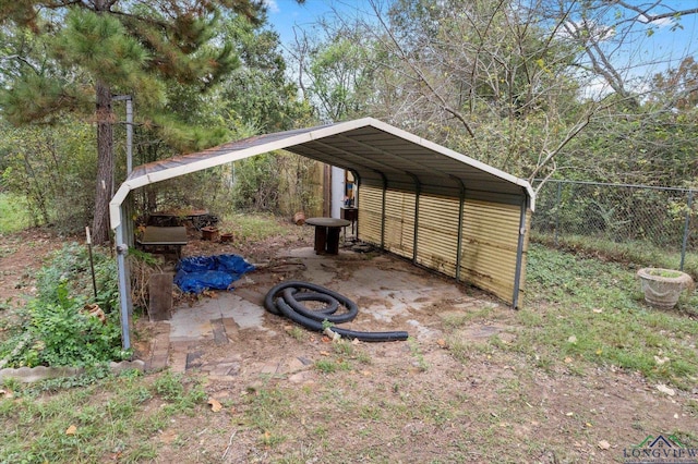 view of yard with a carport