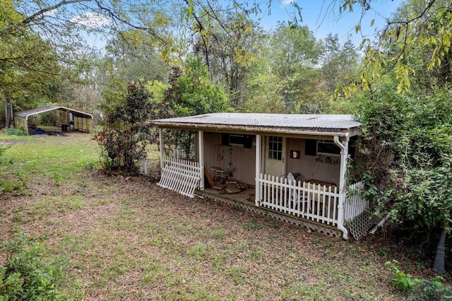 exterior space featuring a carport