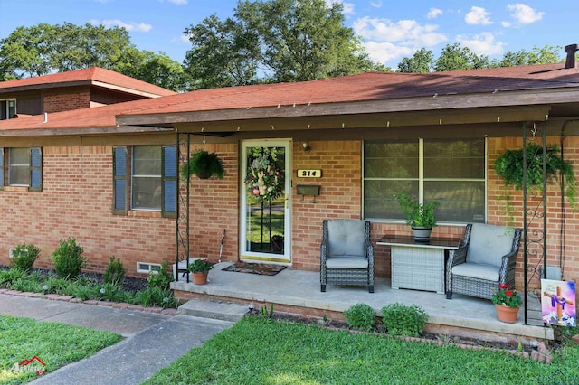 view of front of house with brick siding