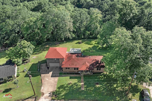 aerial overview of property's location featuring a forest