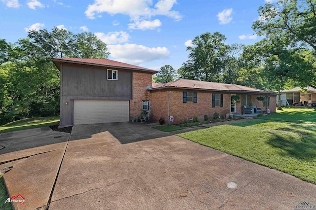 view of front of house featuring concrete driveway, an attached garage, a front lawn, and brick siding