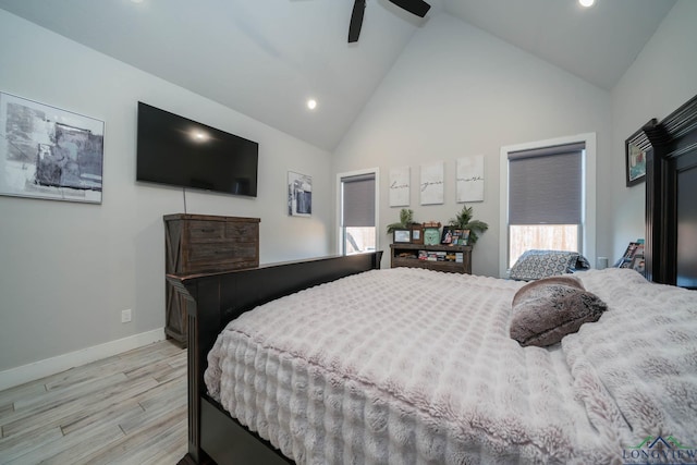 bedroom with high vaulted ceiling, recessed lighting, a ceiling fan, baseboards, and light wood finished floors