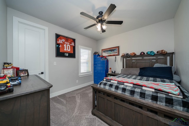 bedroom with carpet floors, ceiling fan, and baseboards