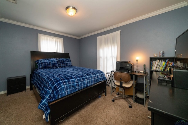 bedroom with ornamental molding and carpet flooring